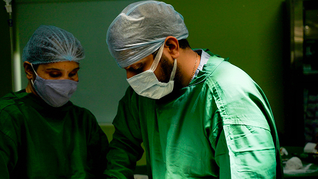 Doctors performing surgery